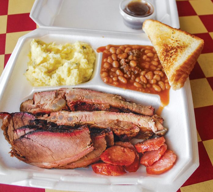 Shank Cat's BBQ rib platter with sausage, mashed potatoes, baked beans, and toast in DeSoto